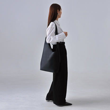 Asymmetry leather bag